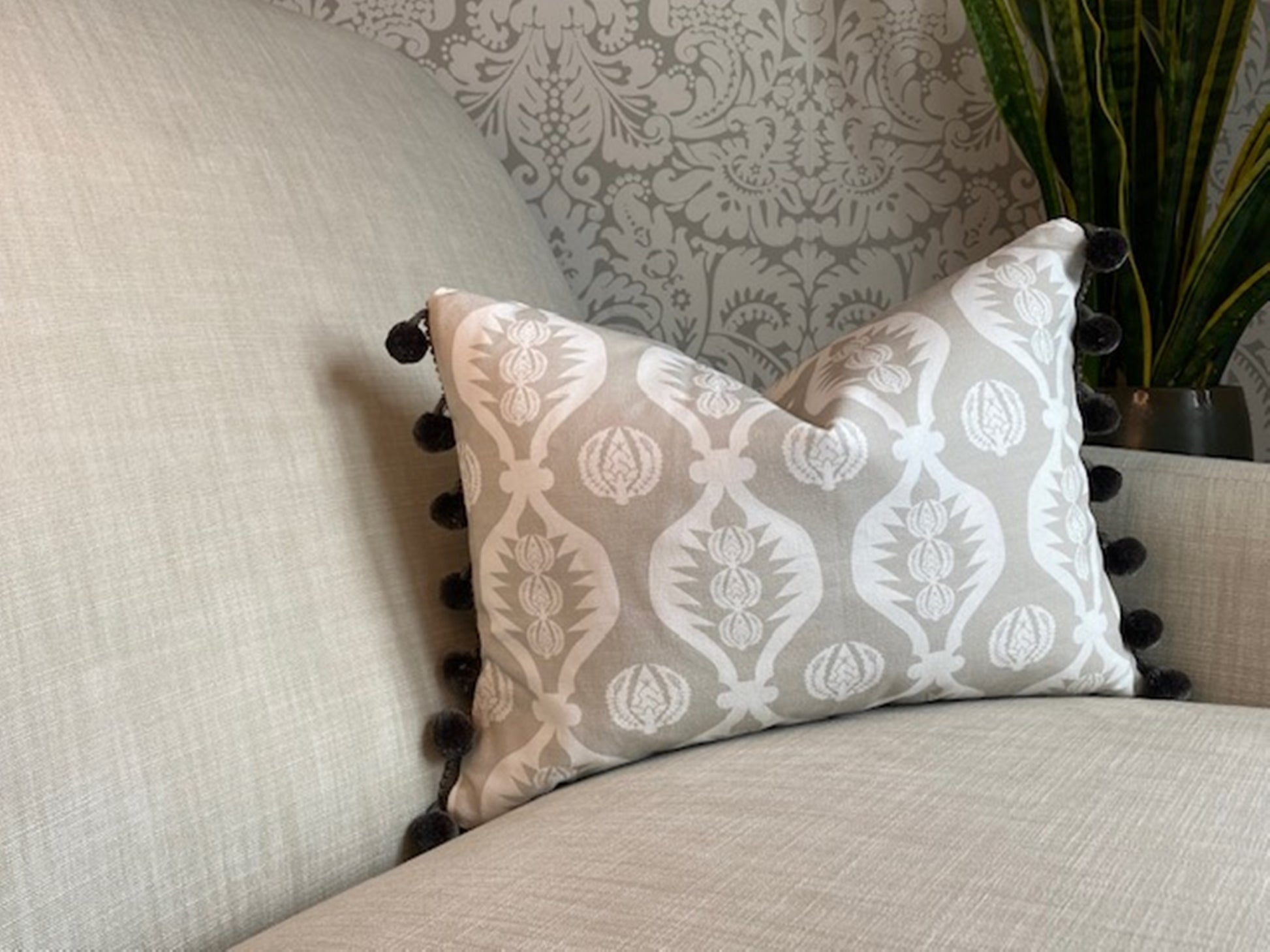 Georgie fabric grey and white cushion with pompom trim