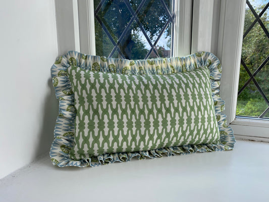 Green cushion  45cm by 30cm with blue and green frill. Feather cushion pad included