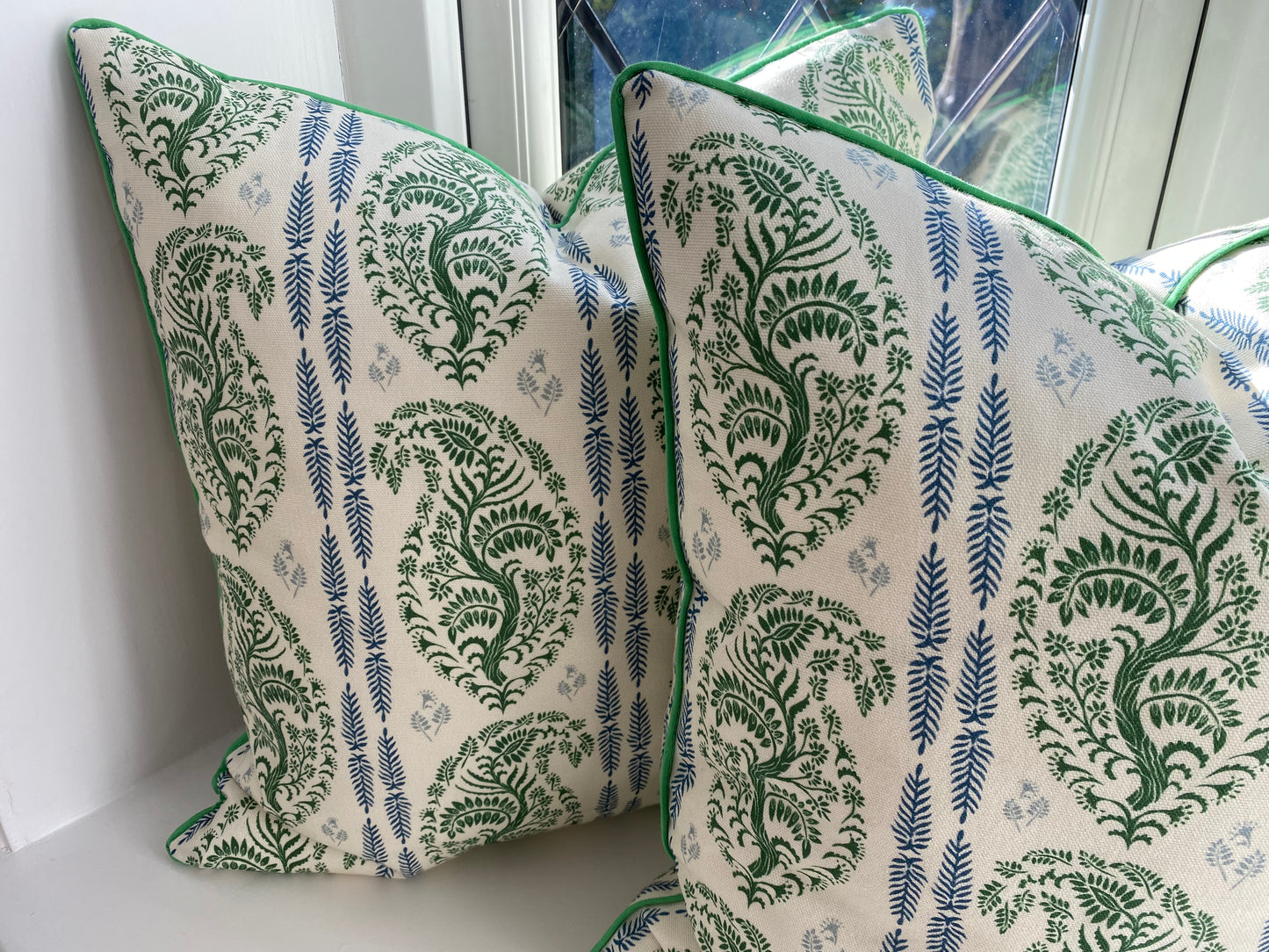 Larisa fabric green and blue cotton piped cushions close up