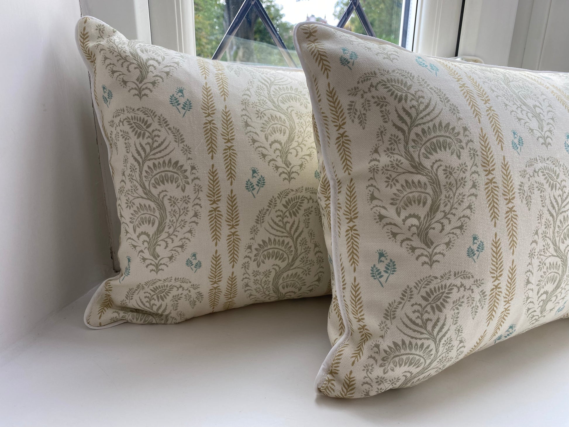 Larisa fabric sage and gold cotton piped cushions