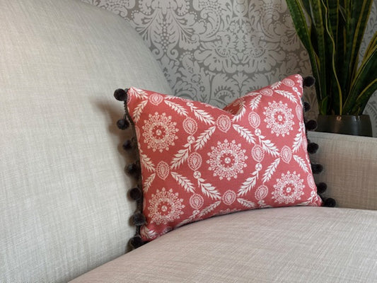 Rosie fabric red cotton cushions with grey pompom trim