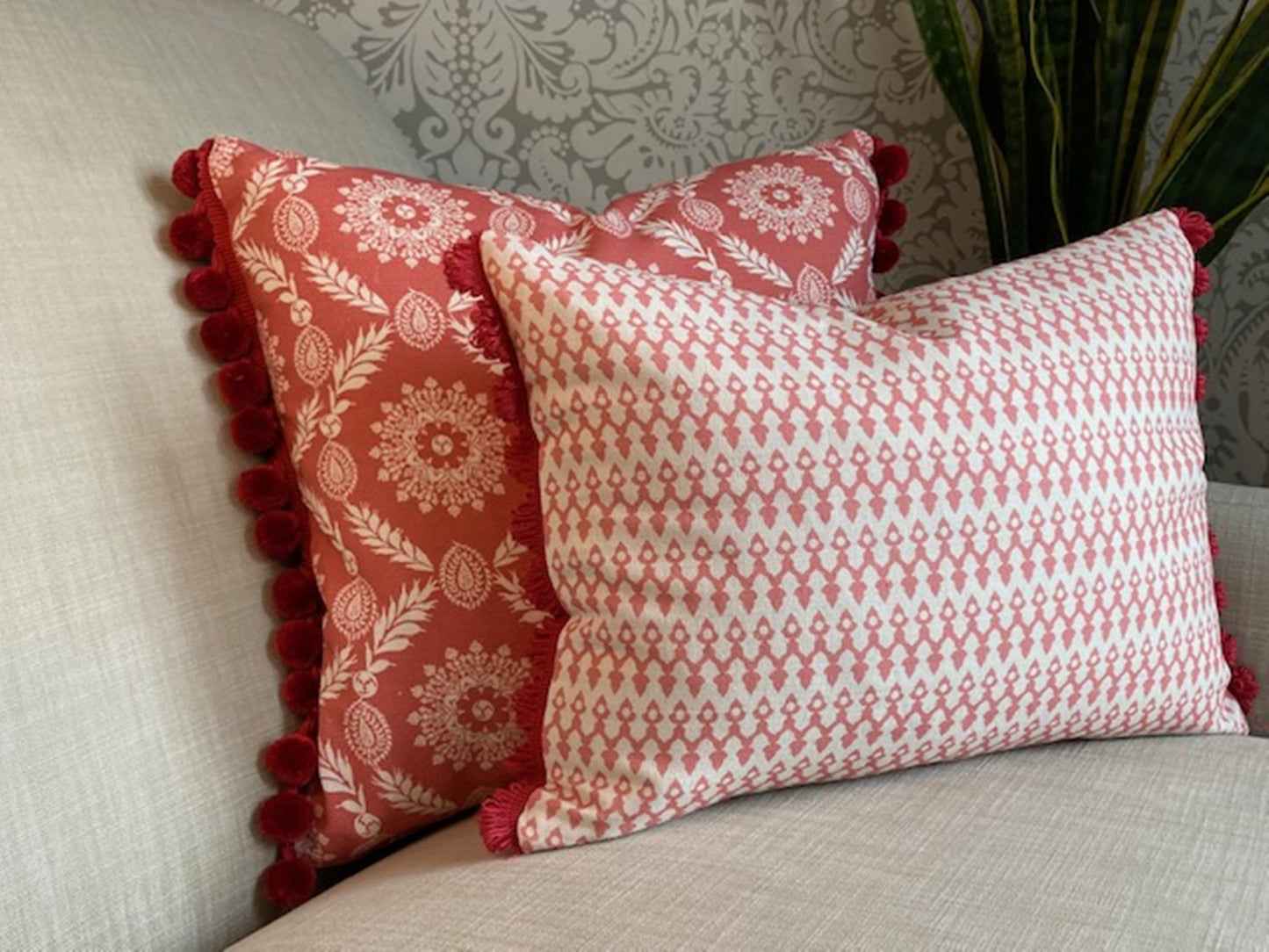 Rosie fabric red cotton cushion with red pompom  trim plus Tea4Two fabric pink cushion with fan trim