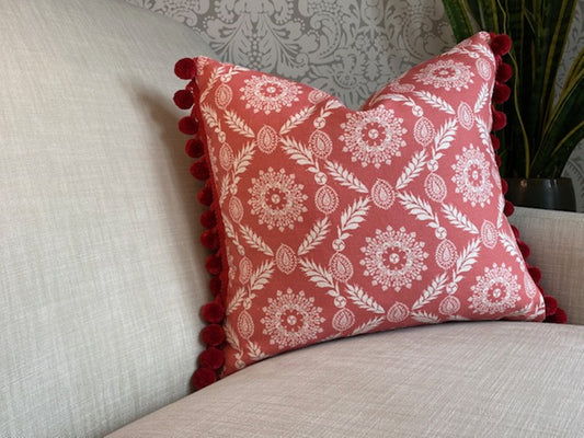 Rosie fabric red cotton cushion with red pompom trim