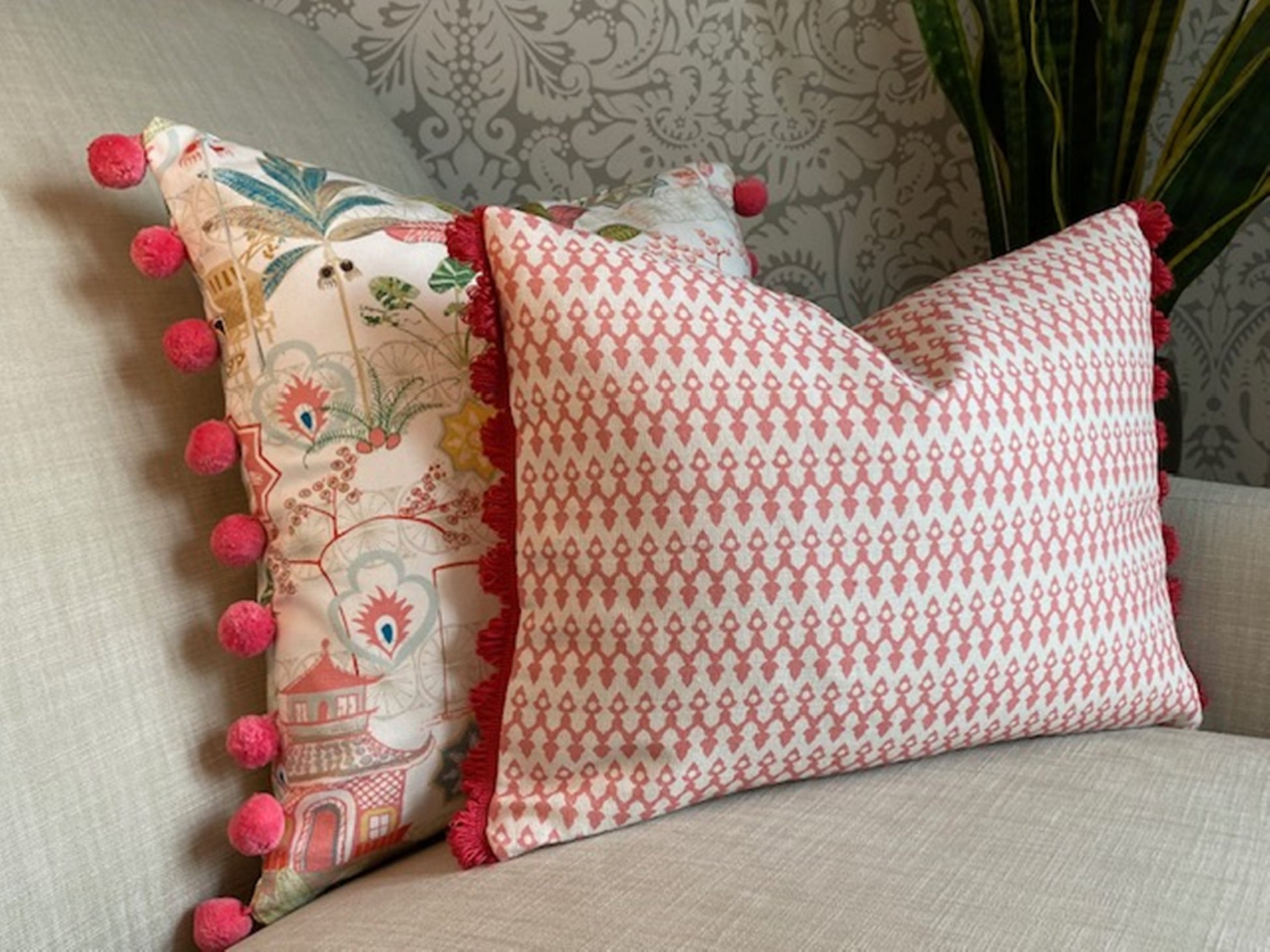 Tea4Two fabric pink cotton cushion with fan trim plus Tiger fabric multi cushion with pompom trim