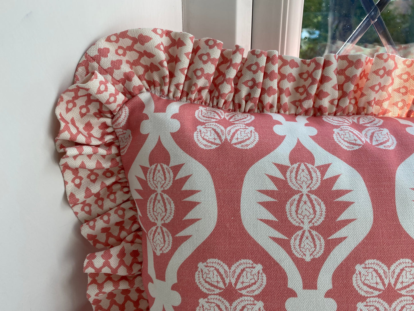 pink frilly cushion close up
